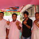 Members of the Shiv Sena show their marked fingers after voting